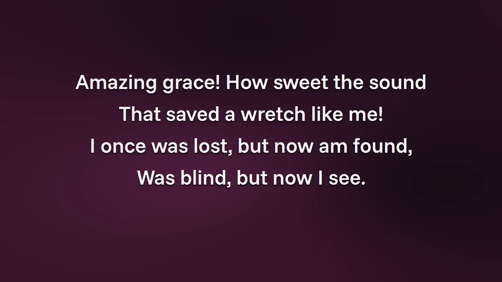 The projector showing the first verse of Amazing Grace